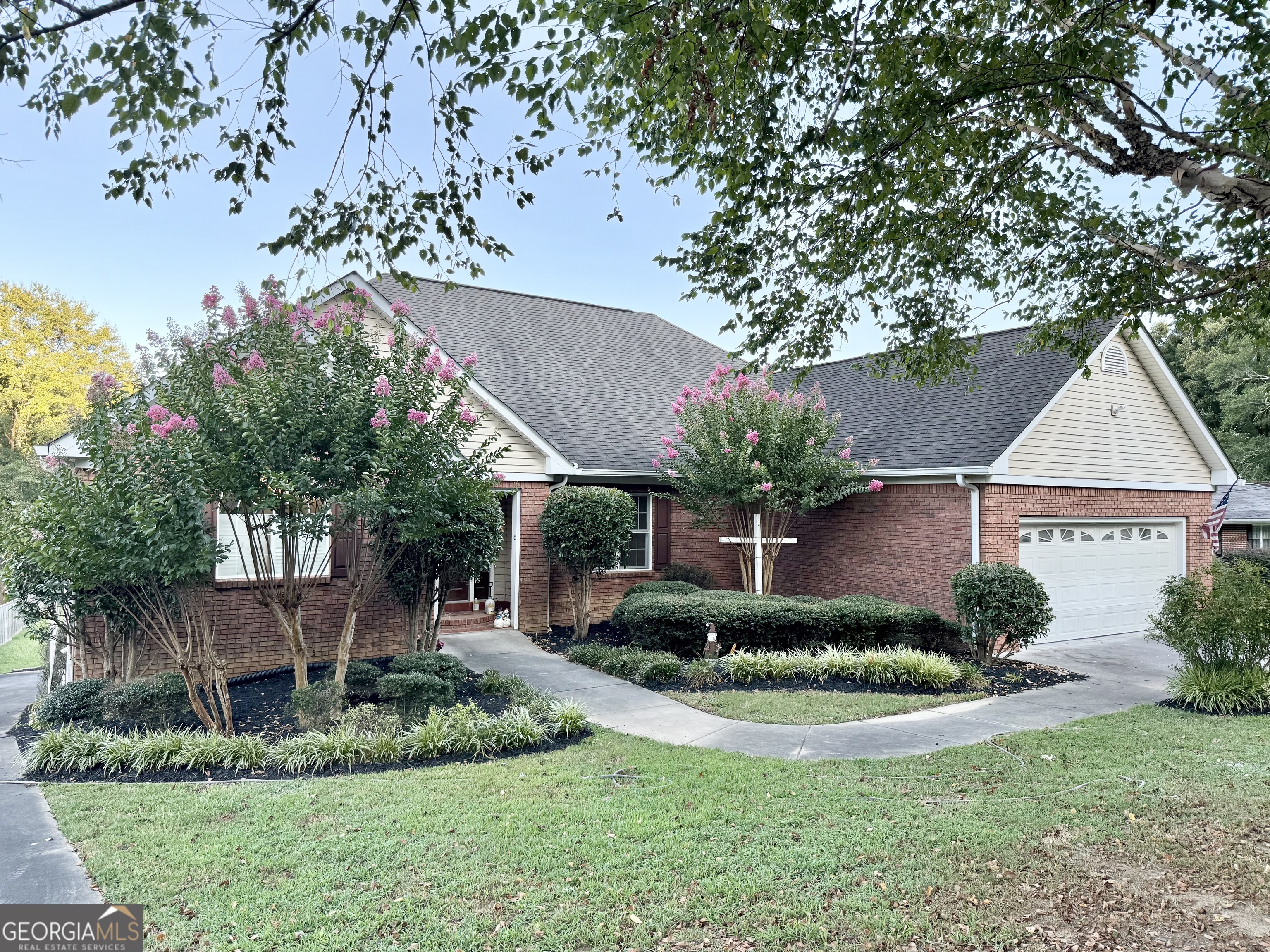 A home you would definitely enjoy coming home to! Take a look at this beautiful 4-sided brick home recently updated from top to bottom. Sitting on .72 acres with recently refinished hardwoods, fresh interior paint, new flooring in full finished basement. A spacious master suite on the main level with jetted tub and a walk-in shower, along with a double vanity in the master bath. Updated kitchen with new granite countertops. This home has a separate dining room, a great room in the basement with all the space you would need for recreation or family room, bonus rooms could be a 5th bedroom, along with a 2nd 2-car garage. Enjoy sitting on the deck overlooking a large level backyard on a wraparound driveway. This home has it all as well as close to hwys, shopping, easy access to 411.