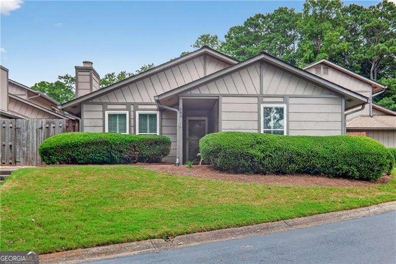 Welcome to this charming garden-style condo at 386 Manning Villas Drive! Ideally located just a short stroll from AL Burruss Elementary and Marietta High School, this home offers both convenience and comfort. Featuring two spacious bedrooms on the main level, the primary suite is a true retreat with its own private fenced courtyard. Recently updated with fresh paint, new carpet, and modern appliances, this condo is move-in ready. Plus, it's close to shopping and everything you need for easy living. A perfect blend of location and style!