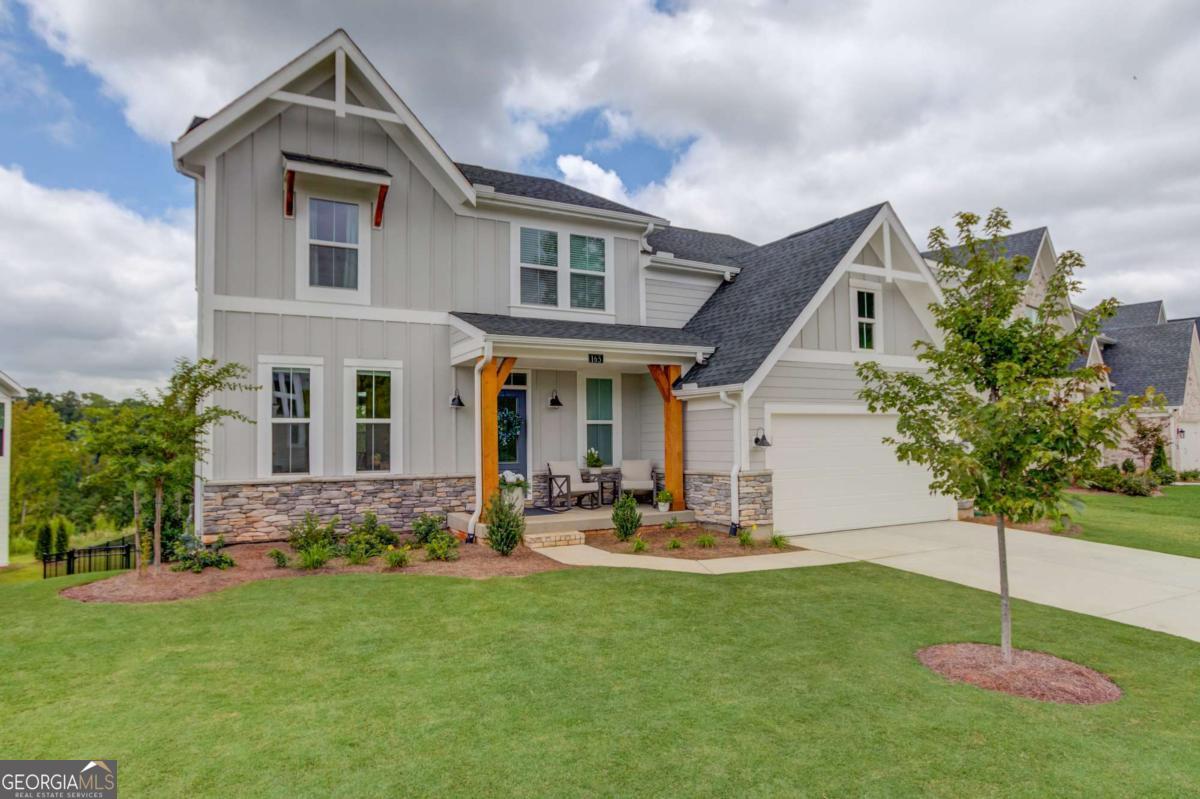 Welcome to 165 Kerr Drive, a stunning 2024-built home tucked away on one of Twin Lakes' most private cul-de-sac streets. Positioned on a premium lot with complete privacy, it captivates from the moment you arrive. Less than a year old, this home offers a rare chance to skip the wait for new construction while enjoying a move-in-ready retreat. The open-concept main level is filled with natural light from soaring two-story windows and features a chef's kitchen with a quartz island, stainless steel appliances, and a butler's pantry perfect for a coffee bar or extra storage. Upstairs, the primary suite boasts a spa-inspired bath and oversized walk-in closet, while three additional bedrooms share a full bath and a convenient laundry room. A versatile bonus room on the main level adds flexible living space, and the unfinished basement provides endless potential. Step outside to a private deck and fenced backyard that overlooks lush greenspace, or enjoy Twin Lakes' resort-style amenities-pools, tennis, fitness center, playgrounds, and scenic trails. With top-rated schools, nearby shopping such as Publix, Mall of Georgia, and downtown Braselton, and easy access to Atlanta, this home blends privacy, convenience, and modern living in one perfect package. Exceptional value for a home of this size, condition, and location. Move in today and start living the Twin Lakes lifestyle!