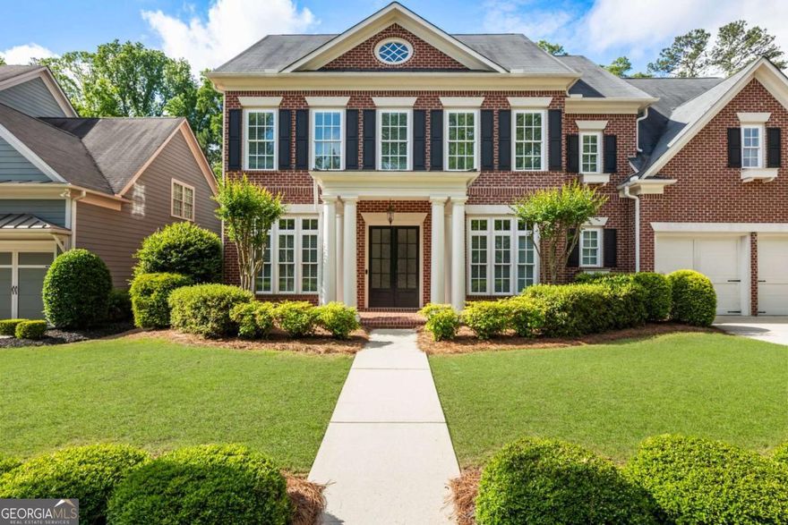 VILLAGE VIBES + LUXURY LIVING    With golf-cart proximity to award-winning schools, boutique shopping and local favorites, this five-bedroom, four-bathroom home pairs effortless livability with the charm of MiltonCOs vibrant village atmosphere. Tucked inside the sought-after John Wielund neighborhood of Braeburn, it is move-in ready and made for memory-making. Relish the proximity to Northwestern Middle School and Milton High School, Six Bridges Crabapple and community events in Downtown Milton and Crabapple. Relax in the flat, fenced backyard with a firepit and a water feature, along with a covered flagstone patio perfect for enjoying peaceful moments, lively get-togethers and everything in between.    Inside, discover airy interiors painted in Alabaster White. The main level commences with a gracious entry and dining area enhanced by stylish trim and hardwood floors. Overlooking the light-filled family room and backyard retreat, the chefCOs kitchen impresses with quartz countertops and backsplash, stainless steel appliances, a center island and ample cabinet storage. Guests will appreciate the comfort and privacy of the main-level suite, featuring abundant natural light and a full en suite bathroom.    Upstairs, retreat to a spacious ownerCOs suite with a sitting room and an en suite bathroom featuring dual vanities, a soaking tub and a separate walk-in shower. Three additional bedrooms and two full bathrooms provide ample space for guests, family, or flexible living arrangements. DonCOt miss the full, unfinished third floor, offering endless potential for any lifestyle ... options include a dream media room, a home gym, a hobby space or a yoga studio. Enjoy the spacious two-car garage with a level driveway and kitchen-level entryCoit makes unloading groceries effortless. Finally, this vibrant community offers amenities for all ages, including a pool, a clubhouse, a fitness center, and nearby parks and green spaces. Welcome to 2165 McFarlin Lane.