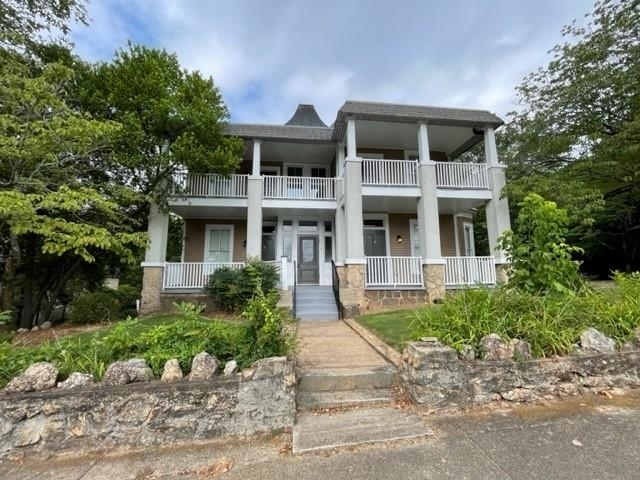 Historic property renovated for apartments ! We have 2 apartments left ! Two Bedroom one bath luxury, spacious apartment with all of the historic charm and modern features. Each unit has its own unique character. Pine floors , tiled showers and full kitchen. Some units have their own private balcony. The rear of the property has a large green space with Dried Indian Creek and a small waterfall. There is a total of 5 apartments in the building with plans for an additional apartment on the premises. The adjoining building has 3 total apartments. The apartment building is located directly beside Cricket Frog Trail which is a walking/bike trail that will carry you for miles through Covington. Walking distance to shopping and dining. Come visit The Apartments at Emory !