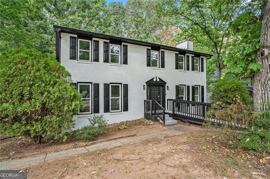This beautiful 4-bedroom, 3-bathroom home sits on a spacious corner lot in the desirable East Cobb area. The open-concept living space flows seamlessly into a modern kitchen with granite countertops and stainless steel appliances. The master suite boasts a walk-in closet and a luxurious en-suite with dual vanities and a separate tub. Enjoy the private backyard with a deck, perfect for outdoor gatherings. Located near top-rated schools, shopping, and dining, this home offers comfort and convenience. Schedule your tour today!