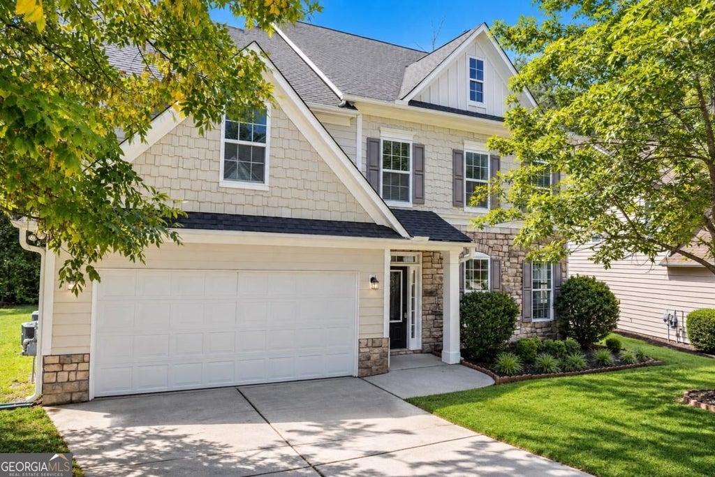 Photo of 1933 Temple Park Drive, Loganville, GA 30052 (MLS # 10850741)