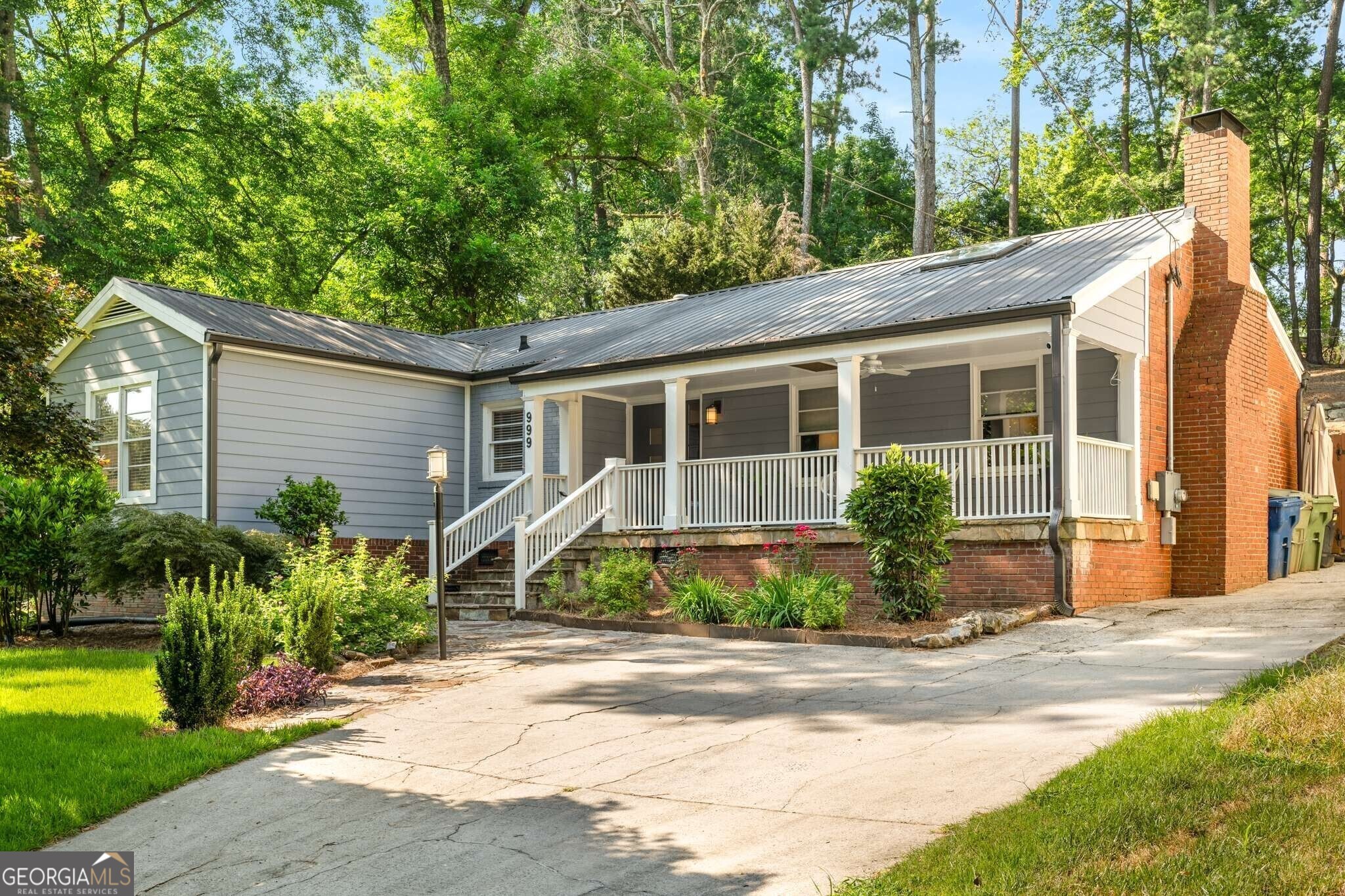 Chic Mid-Century Modern Gem in Lindridge Martin Manor. Welcome to this stylish 3-bedroom, 2-bath home nestled in the highly sought-after Lindridge Martin Manor neighborhood, one of Atlanta's best kept secret neighborhoods. Designed with a classic mid-century modern flair, this home features a bright open-concept layout with a spacious kitchen, dining, and living area-ideal for modern living and effortless entertaining. Step outside to a generous screened-in, covered patio overlooking a large, private backyard-perfect for hosting gatherings or enjoying peaceful evenings. A charming front porch offers the perfect perch to soak in the vibrant energy of the neighborhood, where residents are often out walking dogs or strolling with family. This home is not only stylish but move-in ready with major system updates, including a brand new HVAC system, and young roof and hot water heater, offering peace of mind for years to come. Located just 20 minutes from anywhere in Atlanta, you'll love the unbeatable access to top retail, dining, and major highways, all while enjoying the comfort of a community-focused, centrally located neighborhood. Don't miss your chance to own this well-maintained, design-forward home in one of Atlanta's most convenient and welcoming neighborhoods!