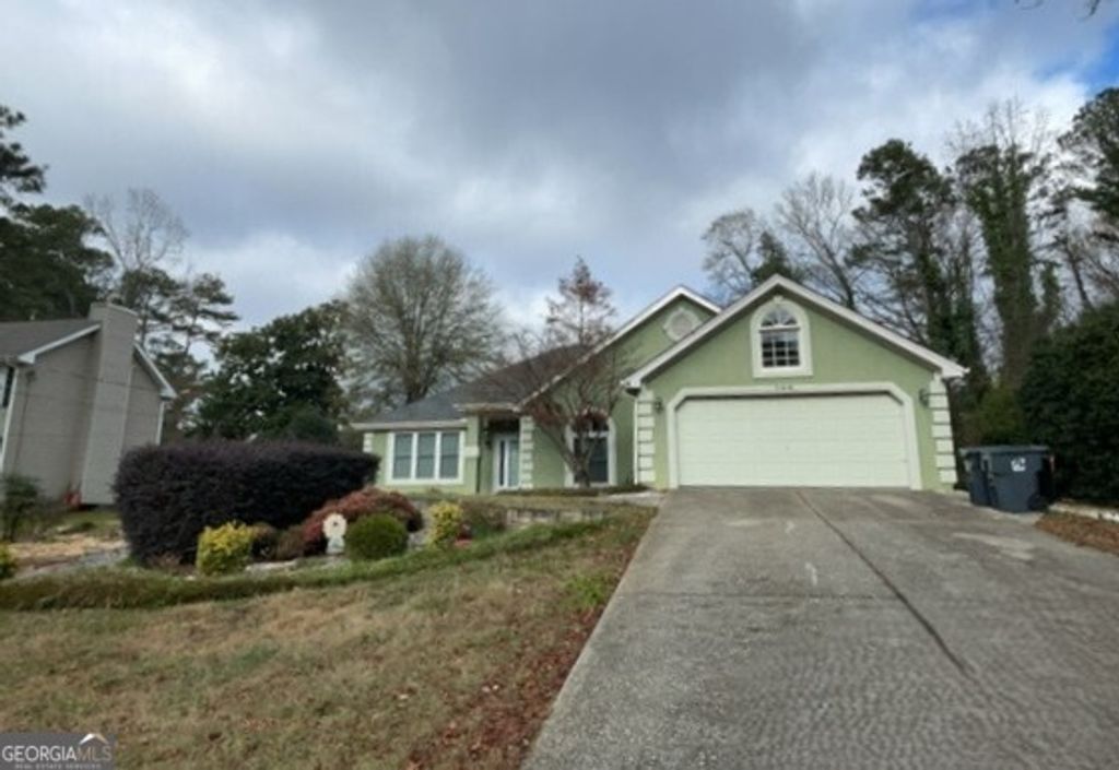 Photo of 709 Oak Moss Drive, Lawrenceville, GA 30043 (MLS # 10659664)