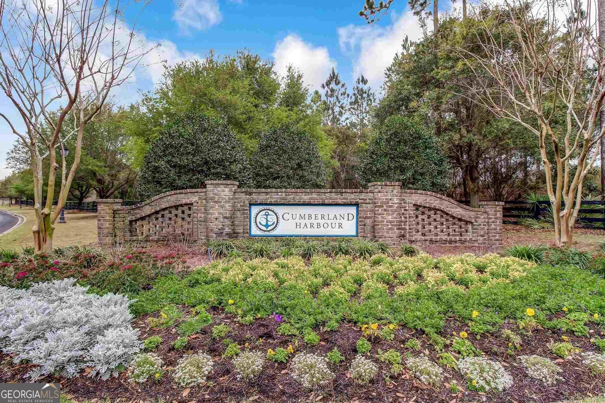 Beautiful marsh front building lot with spectacular sunrise view over Cumberland Island and the marshes of the Intracoastal Waterways in Cumberland Harbour Subdivision. A gated community in SE corner of GA/FL border. Minutes away from Jacksonville Int'l Airport and Jacksonville's shops and medical facilities. This most sought after subdivision has state of the art amenities including 6 tennis courts, 2 pickleball courts, racquetball court, 3 swimming pools, poolside roofed over patio with fireplace for small gatherings, large Spring house with kitchen and serving bar for large parties, fully equipped fitness center and meeting room, playgrounds, nature trails, a day dock for watersports and daily boat parking for property owners, RV parking and more!