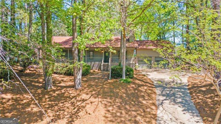 FULLY RENOVATED RANCH IN PRIME ALPHARETTA LOCATION - NO HOA!  Tucked away on a quiet cul-de-sac, this beautifully updated RANCH-style home offers the perfect blend of charm, convenience, and modern upgrades.  With an ALPHARETTA ADDRESS but located in FORSYTH COUNTY, you'll enjoy access to TOP-RATED SCHOOLS and LOWER TAXES. Step inside to discover a fresh, modern interior featuring BRAND-NEW FLOORING, PAINT ( inside and out), CABINETRY, APPLIANCES, and stunning QUARTZ countertops.  Every bathroom has been thoughtfully updated - including a showstopping round soaking tub in the primary suite that is sure to impress. Outside, the home sits on a LARGE, LEVEL, FENCED BACKYARD- perfect for entertaining, gardening, or simply enjoying the privacy it affords.  Relax on the inviting rocking chair front porch or unwind in the peaceful enclosed sunroom just off the kitchen.  Just minutes from GA -400 (Exit 12), HALCYON'S UPSCALE SHOPPING AND DINING and the highly anticipated GATHERING AT SOUTH FORSYTH, this location truly has it all - WITHOUT THE RESTRICTIONS OF AN HOA. Don't miss this MOVE-IN-READY gem in one of the area's most desirable locations!