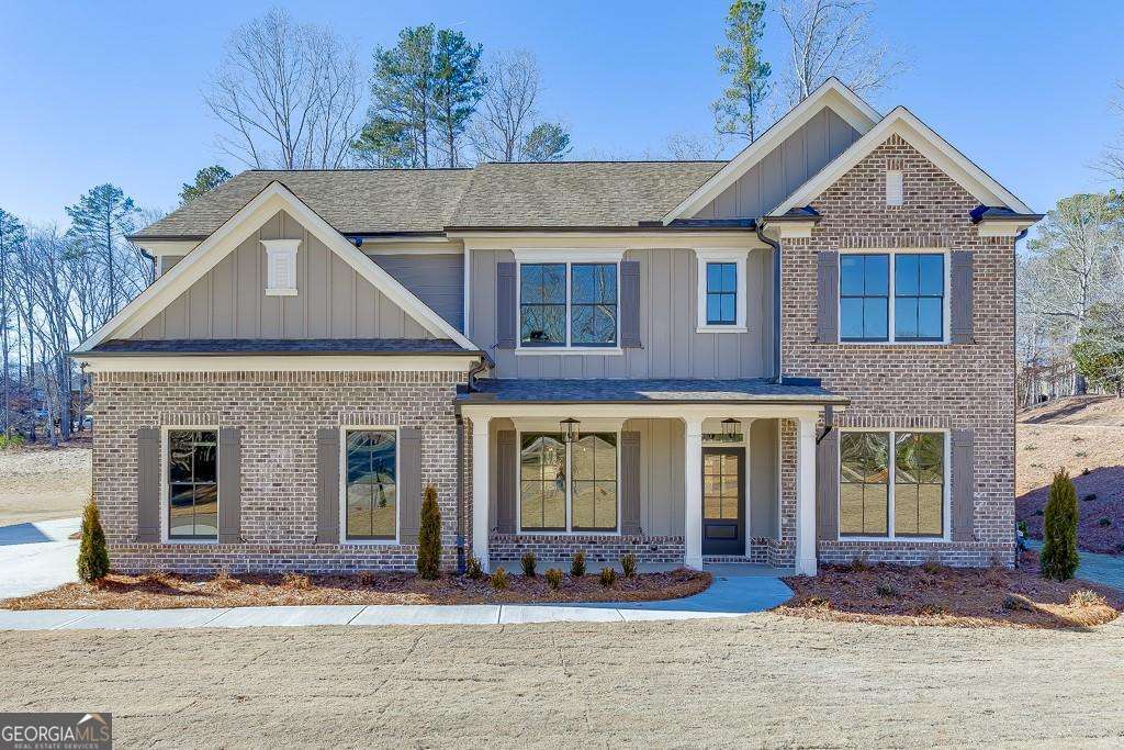 Welcome to The Jackson, new construction by Heritage Group Homes. This spacious floorplan on a full unfinished basement features 4-sides brick exterior with board and batten accent, welcoming covered front porch, and covered back porch - an ideal spot to cozy by the outdoor fireplace for GameDay or morning coffee! A Gorgeous Kitchen with Large Island, Farmhouse Sink, Whirlpool Stainless Steel Appliances & Breakfast Room Open to Family Room with Brick Fireplace, Shiplap Accents, and Built in Cabinetry. Entertain dinner guests in the separate Dining Room, enjoy the convenience of a dedicated Home Office space, or get creative in the Main Floor Craft Room! Upstairs, the Primary Suite includes large vanity with dual sinks/quartz countertops luxurious Super Shower with dual showerheads & bench seat, large closet, and expansive sitting room. Two additional bedrooms with ample closets, well-appointed secondary baths, Laundry Room with Sink/Cabinetry, and Loft complete the Upper Floor. Located in the SWIM/TENNIS/GOLF Community, Lane Creek Plantation. An amazing place to call home, all within highly desirable North Oconee Schools district. (LOT 77C-ELEVATION B). Incentives available with Preferred Lender! STOCK PHOTOS of prior build. Estimated Completion Early 2026.