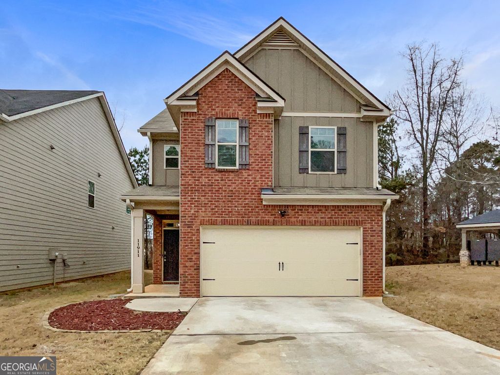 Photo of 11911 Lovejoy Crossing Way, Hampton, GA 30228 (MLS # 10671422)