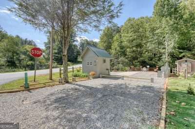 Beautiful Creekfront RV Lot in the Heart of Choestoe with OWNER FINANCING AVAILABLE! This stunning RV lot offers the perfect blend of nature and convenience. Surrounded by beautifully landscaped grounds, the property features a well-kept storage building and outdoor furniture already in place! Enjoy peaceful mornings and evenings along your very own creek frontage with a fire pit area. Located in a well-maintained park, this lot combines natural beauty with community amenities-making it a perfect getaway or full-time spot. And best of all the HOA Fees cover the water, sewer, lawn maintenance & Wi-Fi. The RV park also offers a bathhouse and laundry room. Conveniently located close to Vogel State Park, Helton Falls & Brasstown Bald. Call me today!