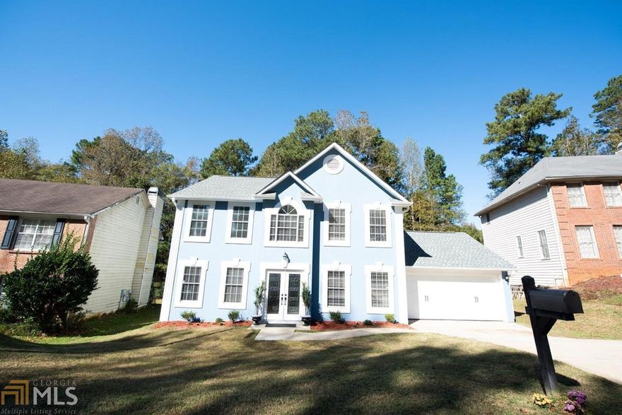 Move right in to this stunning, recently updated home with so many gorgeous upgrades throughout! An abundance of windows brings sunlight throughout this light and inviting home. Open concept family room has views to kitchen featuring granite counter tops & ss appliances and to the dining room. Separate office on main is perfect for working or schooling from home! Spacious master suite showcases a sitting area and a gorgeous Brand New Master Bathroom. Updated bathrooms throughout + 3 add'l bedrooms. Enjoy outdoor living on a private deck overlooking the wooded lot.