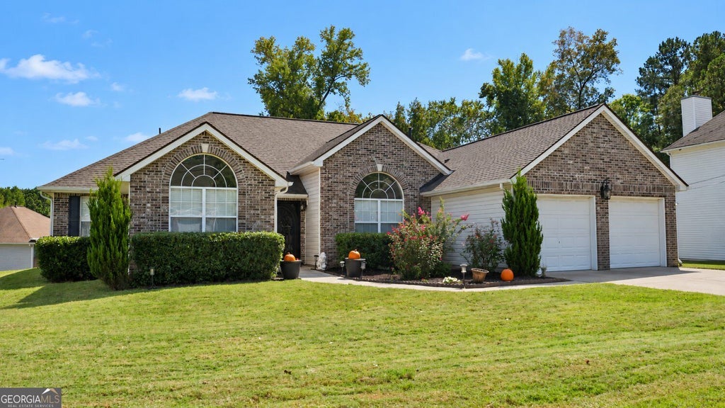 Photo of 2277 Boulder Run Trail, Ellenwood, GA 30294 (MLS # 10869260)