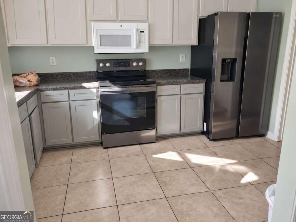 Photo of 1026 S Confederate Drive, Macon, GA 31220 (MLS # 10872965)