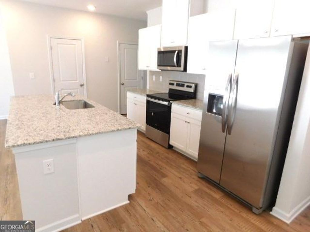 Photo of 5313 Melbourne Lane, Flowery Branch, GA 30542 (MLS # 10737374)