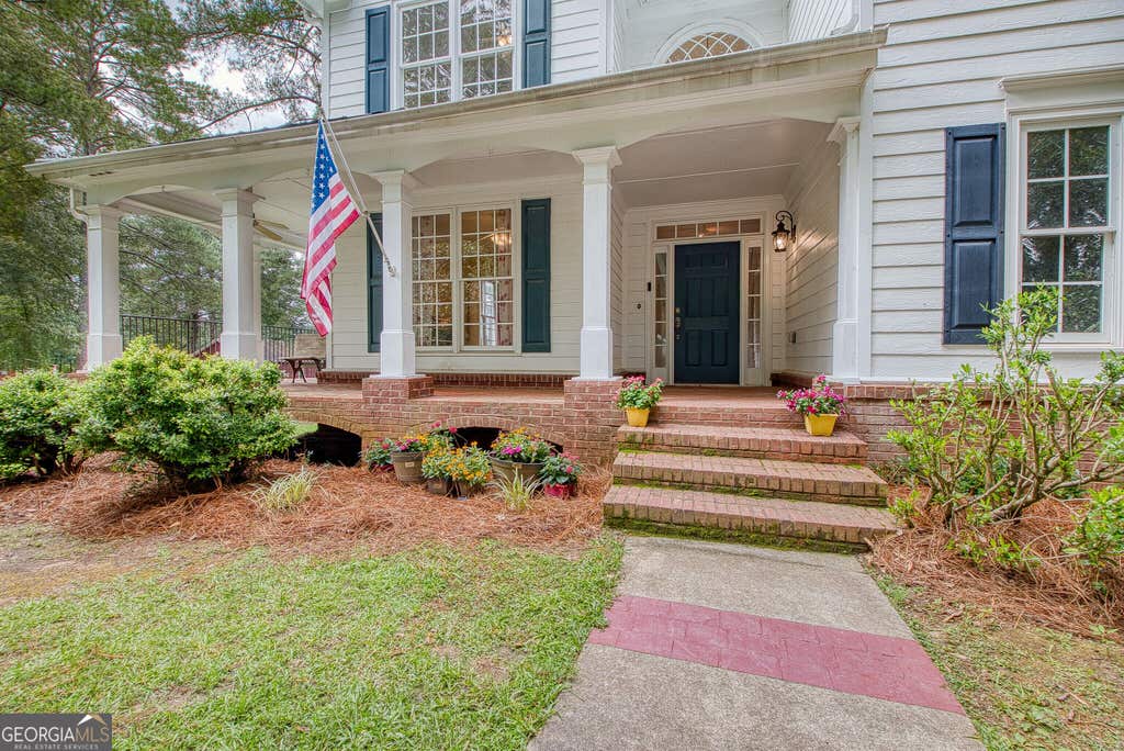 Photo of 205 White Rd, Fayetteville, GA 30214 (MLS # 10823755)