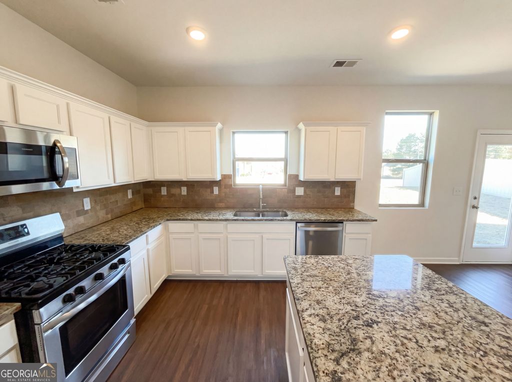 Photo of 529 Emporia Loop, McDonough, GA 30253 (MLS # 10681512)