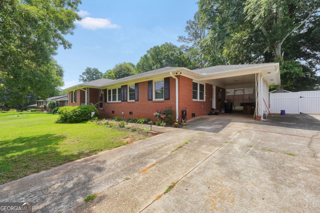 Photo of 105 Pine Street, Barnesville, GA 30204 (MLS # 10786419)