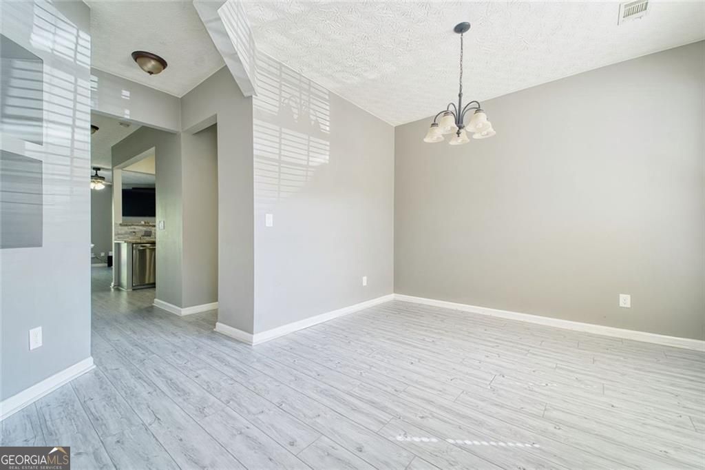 Photo of 1207 Penhurst Way, Lawrenceville, GA 30043 (MLS # 10652279)