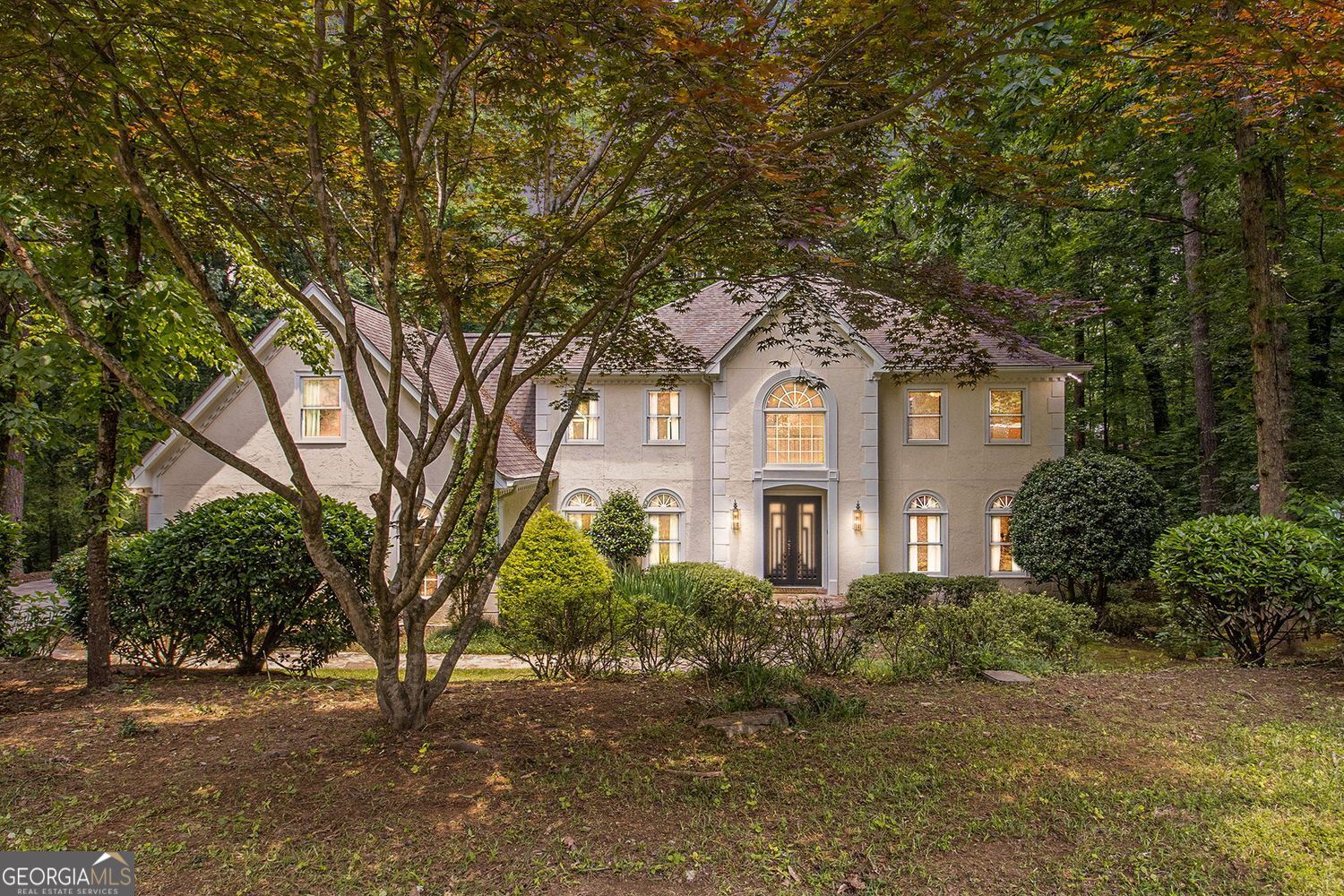LEASE or LEASE TO OWN: Sandy Springs has 6 Bedrooms and 5.5 Bathrooms, a timeless elegance in a Premier Location!! Welcome to this exceptional custom-built estate home positioned on a beautifully landscaped 1+ acre lot offering the perfect blend of definitive sophistication and modern convenience. As you step inside, you're welcomed by a grand foyer flanked by formal living and dining room and greeted by soaring ceilings, rich hardwood floors, and an open flowing layout designed for both entertaining and comfortable daily living. The fireside family room, with its striking wood-beamed ceilings and recessed lighting, flows effortlessly into a chef's kitchen adorned with a gold farmhouse sink, gas cooktop island, wine fridge, and endless elegant finishes. A sunroom off the main level provides serene views of the tree-lined backyard. Also on the main level are a guest suite with a full bath, a stylish half bath, and a large walk-in laundry room. Upstairs, discover four spacious bedrooms and three full baths. The luxurious owner's suite is a true retreat, featuring tray ceilings, its own fireplace, dual vanities, a spa-inspired soaking tub, oversized glass-enclosed shower, water closet, dual vanities, and an expansive walk-in closet. Spacious secondary bedrooms include en-suite baths and generous closets. One of the secondary bedrooms includes an attached bonus room-perfect for a playroom, office, or private lounge. The finished basement offers a large recreation room with a custom wet bar and fireplace, an additional bedroom and full bathroom, and a generously sized storage room with custom wood shelving. While the lower lever offers either a media room, game area, private guest suite, and direct access to the backyard oasis consider this ideal for entertaining or multigenerational living! Blending timeless design with modern upgrades and an abundance of living space across all levels, this home is a rare find in a coveted location! Such an experience of classic grace and Southern charm in one of Sandy Springs' most beloved neighborhoods near the tranquil Chattahoochee River and the prestigious Horseshoe Bend Country Club. Discounted rate options and no lender fee, future refinancing may be available for qualified buyers of this home.