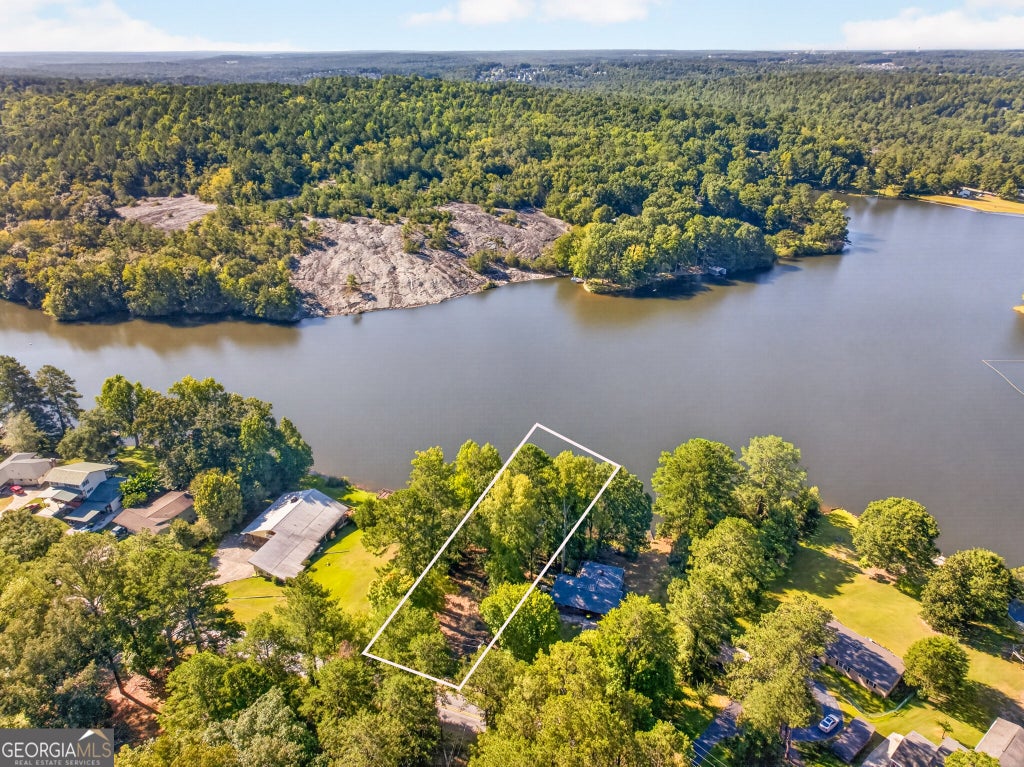 Photo of 2503 Lakeshore Dr NE, Conyers, GA 30012 (MLS # 10843546)