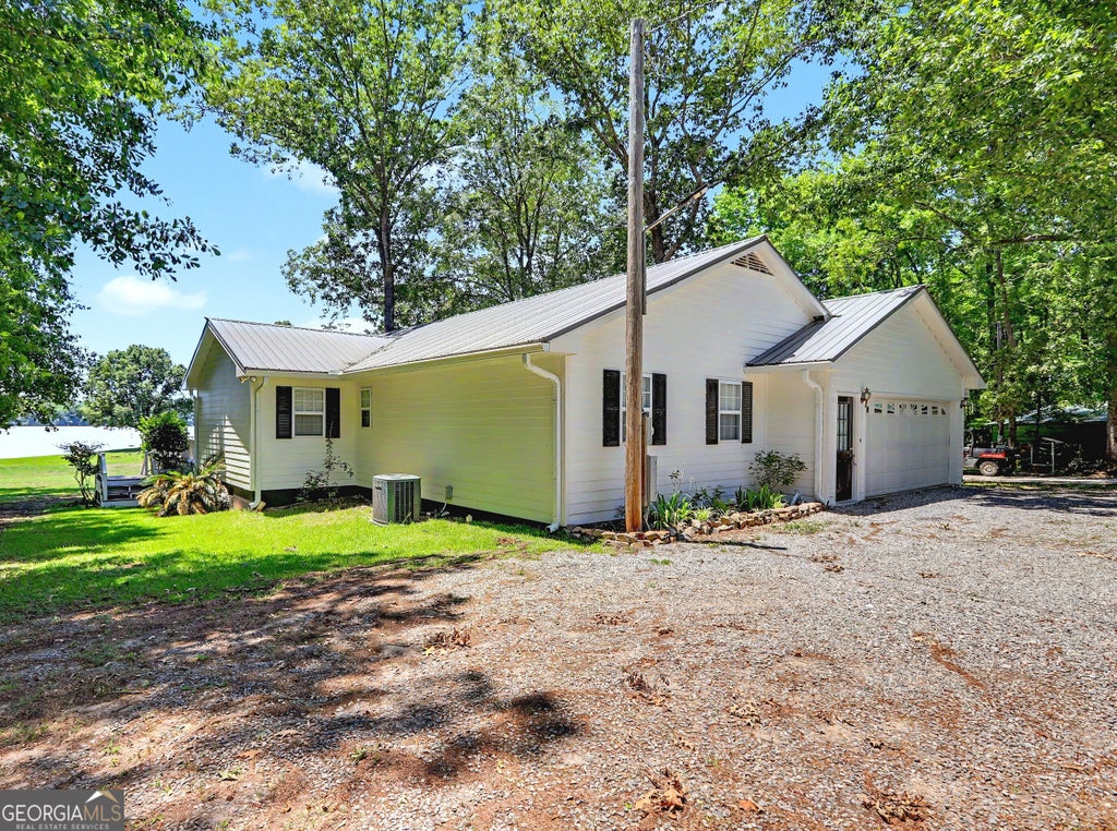 Photo of 1691 Arrowhead Rd, Greensboro, GA 30642 (MLS # 10779142)