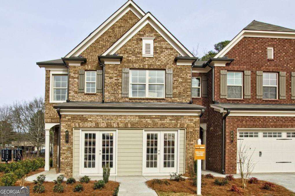 For Rent - Spacious 3BR/2.5BA Townhome in Lanier High School District Welcome to 1476 Lanier Vista Dr - a well-maintained and thoughtfully designed 3-bedroom, 2.5-bath townhome located in a quiet, desirable community. The main level features an open-concept floor plan with beautiful hardwood flooring and a modern kitchen that flows seamlessly into the dining and living areas-ideal for both daily living and entertaining. Upstairs, the oversized primary suite includes a walk-in closet and private bath. Two additional bedrooms and a full bath provide ample space for family, guests, or a home office. This rental includes essential appliances-refrigerator, washer, and dryer-as well as professional lawn care, offering a truly low-maintenance living experience. Located within the highly rated Lanier High School district and close to shopping, dining, and major commuter routes, this home combines comfort, convenience, and value. Available for immediate move-in.