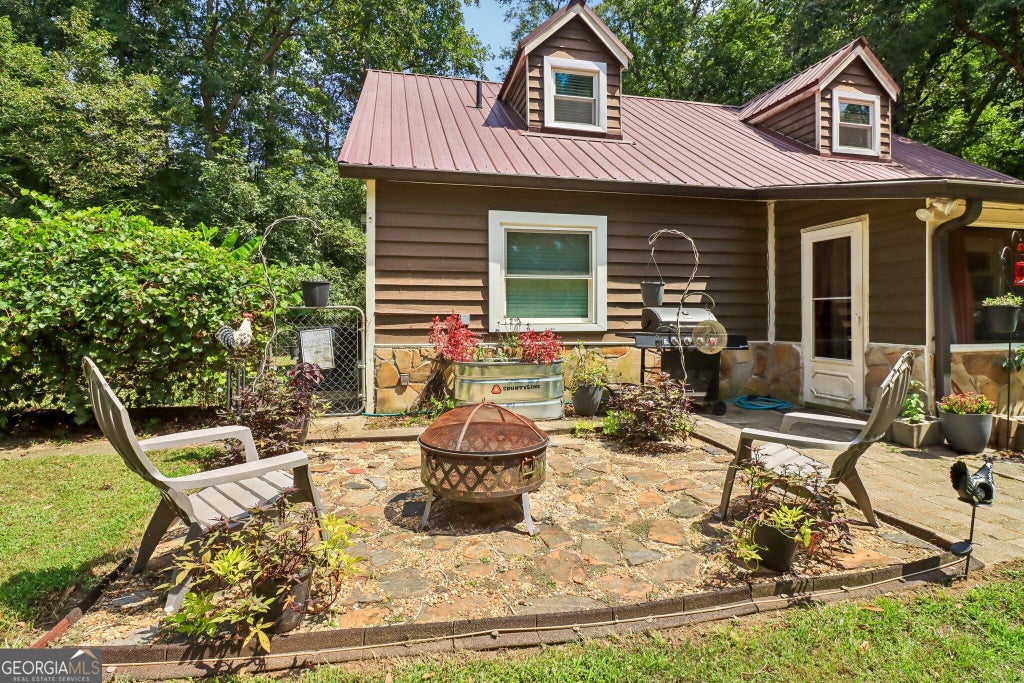 Photo of 1572 Jersey Social Circle Road, Covington, GA 30014 (MLS # 10839388)