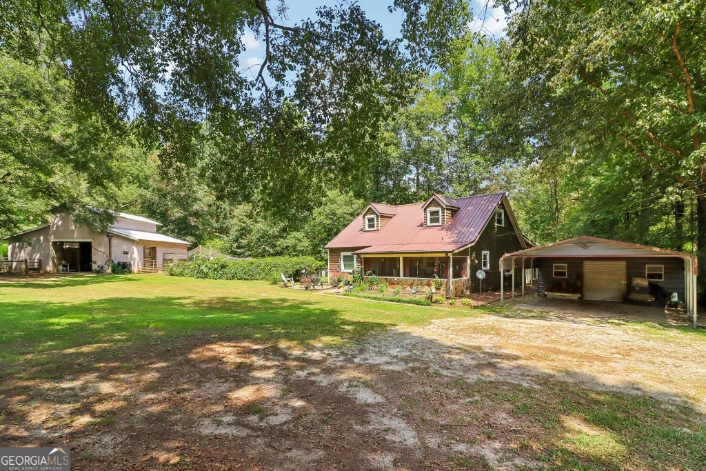 Photo of 1572 Jersey Social Circle Road, Covington, GA 30014 (MLS # 10839388)