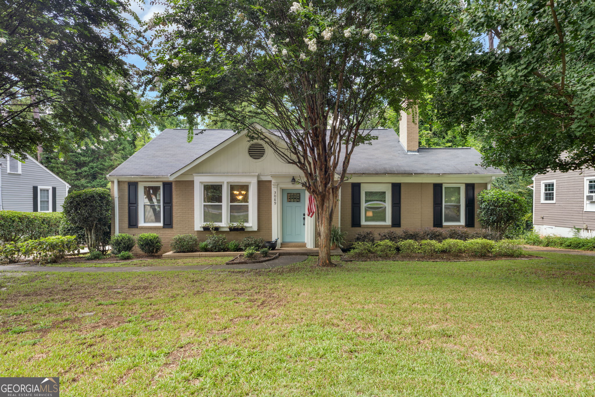 Midtown Macon brick beauty on a half acre! Boasting with curb appeal, this home has the exterior presence to match its interior comfort! With a lovely layout of 1563 total square feet, this 3 bedroom/2 bath home meets every need. A flex space off the living room could serve as an office or playroom. There is room to host dinners in a separate dining room overlooking the pretty front yard. Cabinetry and shelving are abundant in the kitchen and with updated appliances. Helpful side and back entrances allow for ease and convenience to the driveway and spacious backyard! And what a backyard?! This home allows you to relax in peace after a long day on its generous back deck. There's even a pup opening on the deck leading down to a smaller fenced-in area where the dogs can have their own backyard party! This private setting is framed with greenery adding extra beauty and uniqueness! Schedule your showing today to see all 3089 Highpoint Drive has to offer!