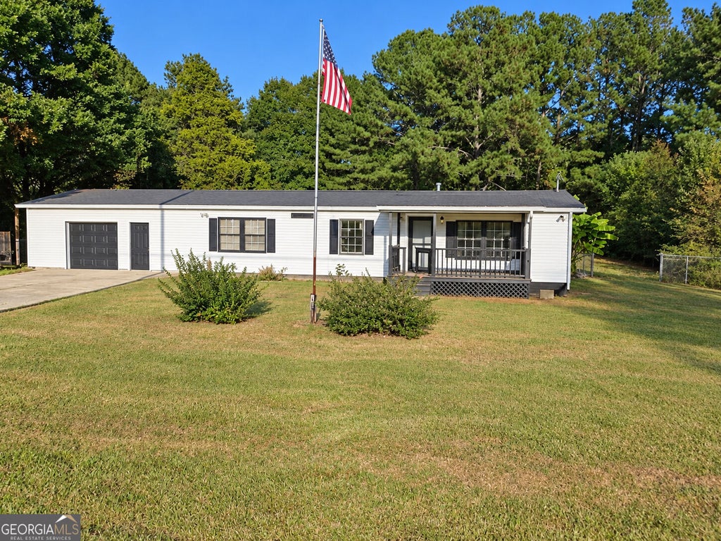 Photo of 910 Steele Drive, Hampton, GA 30228 (MLS # 10877779)