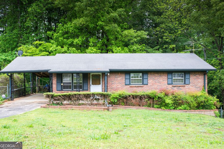 Hey, do you love a good DIY project and have been told you have great vision, then you have found the perfect listing for your next project!  Also, an excellent listing for a buyer looking to use a FHA 203K loan, so he could end up with equity once improvements have been completed.  This well-maintained house on a large, wooded lot, with a fenced backyard for children and pets to play with, is undoubtedly the perfect challenge for the right informed buyer. Kitchen is equipped with stainless appliances. Hardwood floors found throughout the main floor. Cozy wood paneled walls featured in the living and dining room combo. A full unfinished basement ideal for a growing family. Currently, shelving is installed throughout the basement for easy and efficient storage. A two-level shed located in the backyard, used as a workshop and for additional storage. House is conveniently located near the East West Connector for an easy commute to work; also, schools, shopping and restaurants are only a short drive away. It is a wonderful opportunity for the 1st time home buyer and/or a young family. It's priced to sell fast and won't last long!