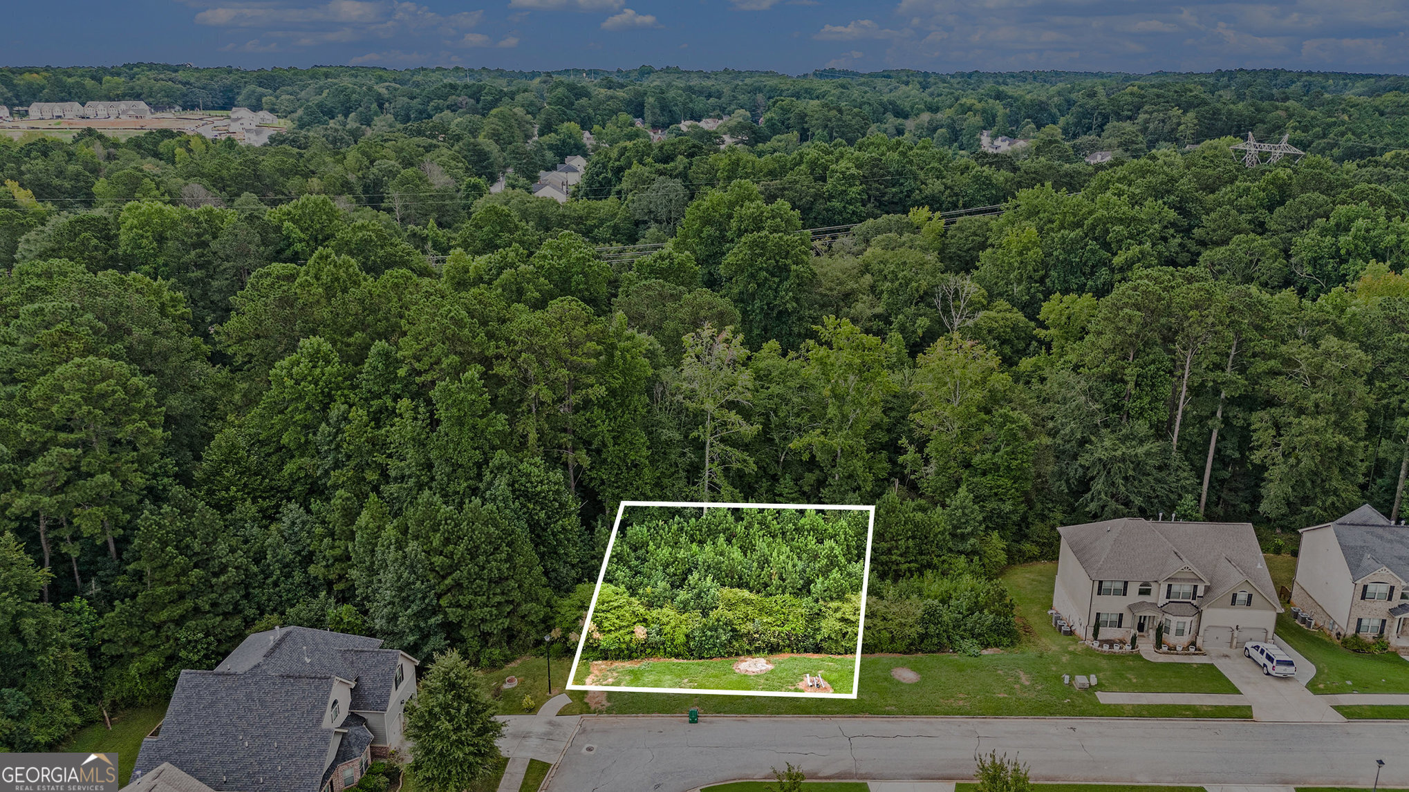 Fantastic opportunity in the well-established neighborhood of Parks at Stonecrest with its great amenities. Lot is zoned residential, and utilities are ready to go. Location, location, location-just minutes from Stonecrest Mall and I20. Seller would prefer to sell 7974 and 7980 together. 7974 and 7980 could be bundled into one sale.