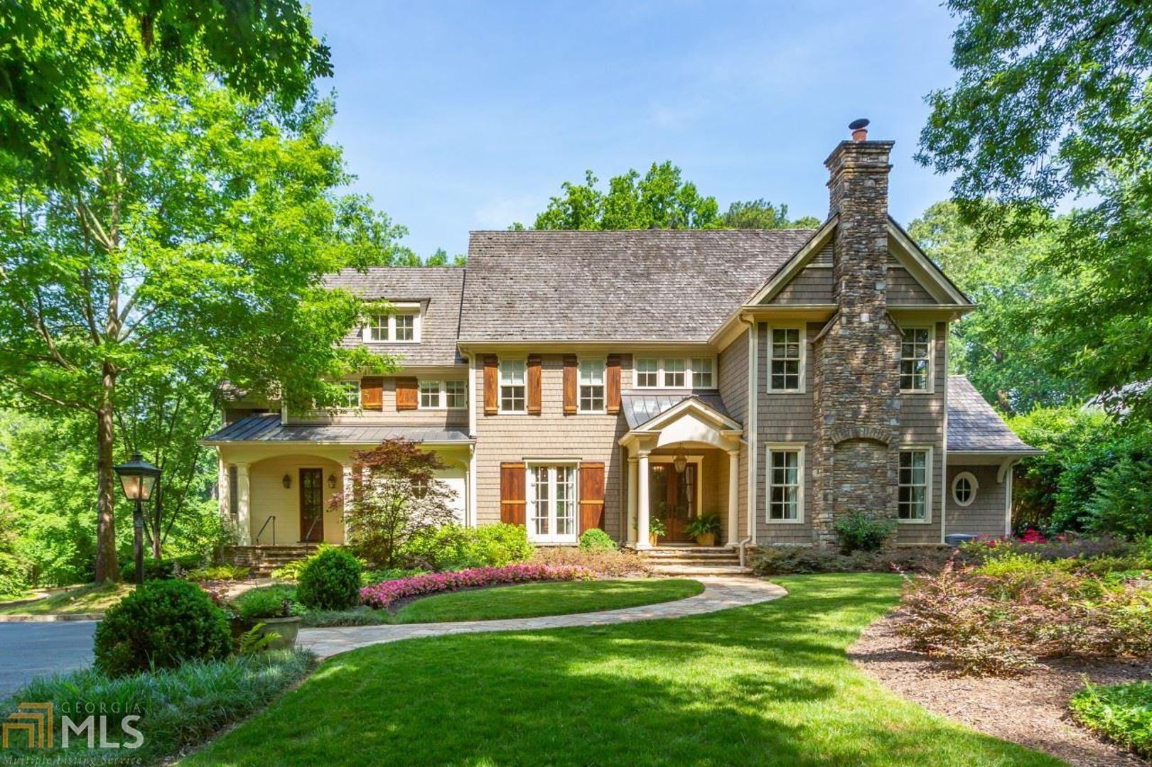 Situated in an ideal location with easy access to private schools in the Heart of Buckhead near I-75. Flexibility of egress from either West Paces Ferry or Northside Parkway. Designed by Bill Baker and Built by Berndsen Custom Homes. Master on the main. 3 en suite BR up, plus playroom and craft room. BR& BA lower level, 3 car garage, elevator to all 3 floors. Stairs to all 3 levels both sides of the home. Great lot!