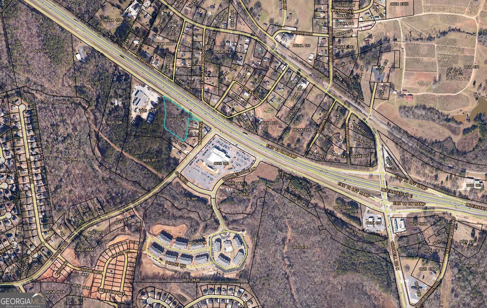 Fast-growing area of Newton County - Zoned Highway Commercial, 2.63-acre building lot. Highway Commercial and Character Area Live/Work Corridors. Perfect for many uses. Location: Access Road near Exit 90, Almon Road, and Fairview Road. Water and Sewage Access. This location offers easy access to Covington and Conyers. Many new homes and Apartments Are Located less than 0.25 miles away. Commercial, industrial buildings, and an auto dealer are nearby. Please note: the property is sold with an empty shell building on the property.