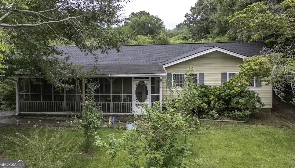 This inviting stepless ranch offers 1,673 square feet of easy, comfortable living on a beautifully maintained fenced lot. The backyard is a true retreat, featuring fruit trees, manicured shrubs, and colorful blooms. Inside, an open-concept kitchen, dining, and living area creates a bright, airy heart of the home, perfect for both everyday moments and memorable gatherings. You'll also enjoy a spacious laundry room, four well-appointed bedrooms, and a shady screened porch for relaxing year-round. This one checks all the boxes. Schedule your tour today!
