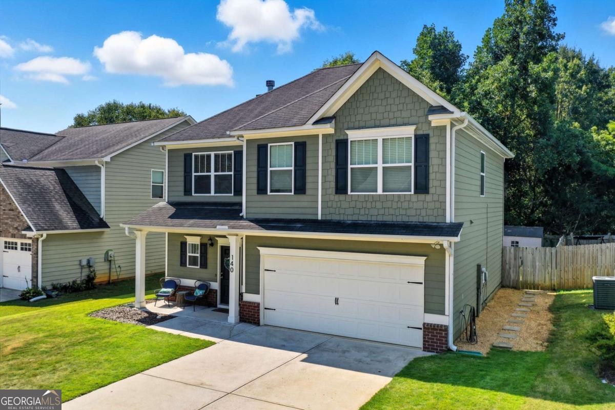 Welcome to this charming 3 bedroom, 2.5 bath home in the desirable River Brook subdivision of Ball Ground, GA! With a spacious layout offering approximately 1,900 sq. ft., this home is designed for both comfort and functionality. The main level features an open-concept floor plan with a bright kitchen overlooking the living room, perfect for entertaining and family gatherings. A convenient half bath for guests, a two-car garage, and access to the fully fenced backyard complete the first floor. The backyard has been recently landscaped with new plantings and includes a storage outbuilding that remains with the property-ideal for tools, hobbies, or extra storage. Upstairs, you'll find brand-new carpet throughout, a laundry area, and a versatile loft-style flex space that's perfect for an office, homework station, or play area. The spacious owner's suite offers a private retreat, while the two additional bedrooms provide plenty of room for family or guests. This home has been lovingly maintained and is situated in a wonderful community featuring a neighborhood pool and playground. The location is truly unbeatable-just minutes from Canton's Riverstone Parkway, downtown Canton and The Mill on Etowah, historic downtown Ball Ground, shopping, dining, Northside Cherokee Hospital, and I-575 access. Don't miss your chance to own this move-in ready home in a prime location!