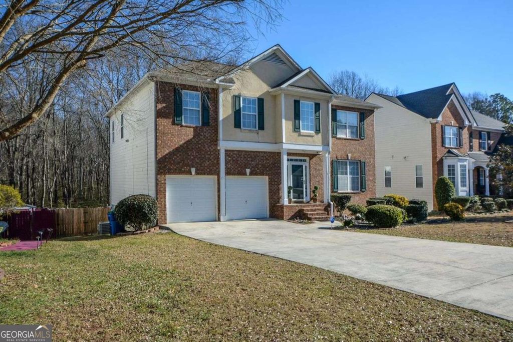 Photo of 6032 Riveroak Terrace, Atlanta, GA 30349 (MLS # 10681105)