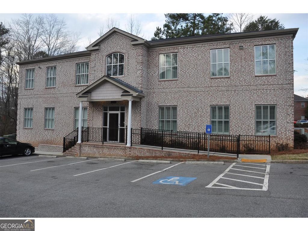 Photo of 4652 Lawrenceville Highway NW, Lilburn, GA 30047 (MLS # 10770869)
