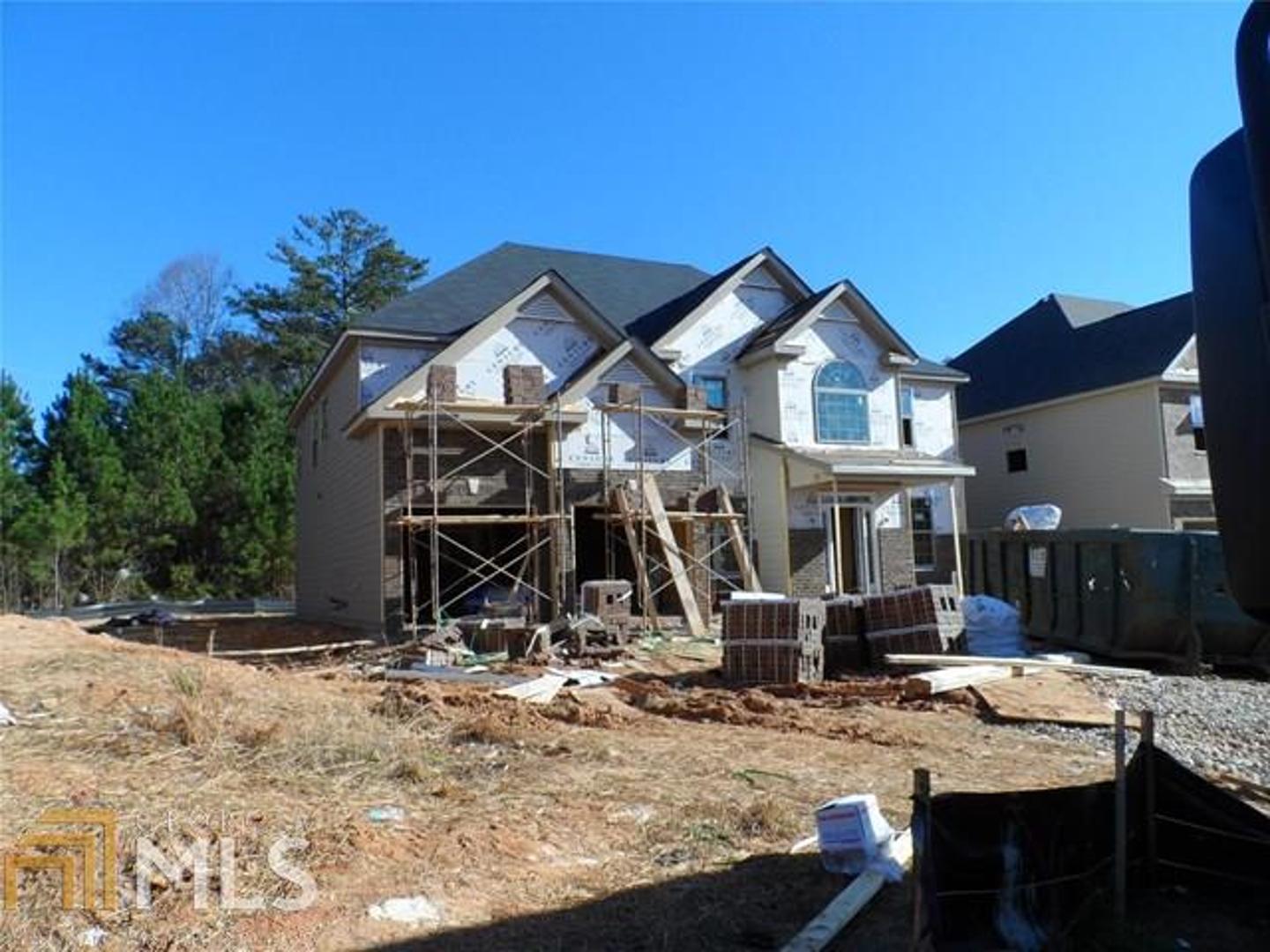 Photos are NOT of actual home. The Oakwood B boasts a generous 5 bedrooms/4 Full Baths with 42" Cabernet Cabinets, Giallo Firito Countertops, 5" Handscraped Hardwoods in Foyer, Hall, Kitchen & Bkfst Area, Study, Dining, and Family Room with Stainless Steel Whirlpool Appliances with Refrigerator, Stacked Stone Fireplace, and Level 2 Shower in Master Bath with tile pan and tile floors. The home will be ready late December, 2015 early January, 2016.