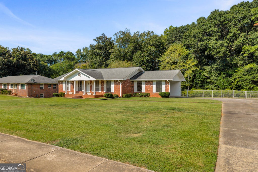Photo of 6125 Phillips Drive, Morrow, GA 30260 (MLS # 10841418)