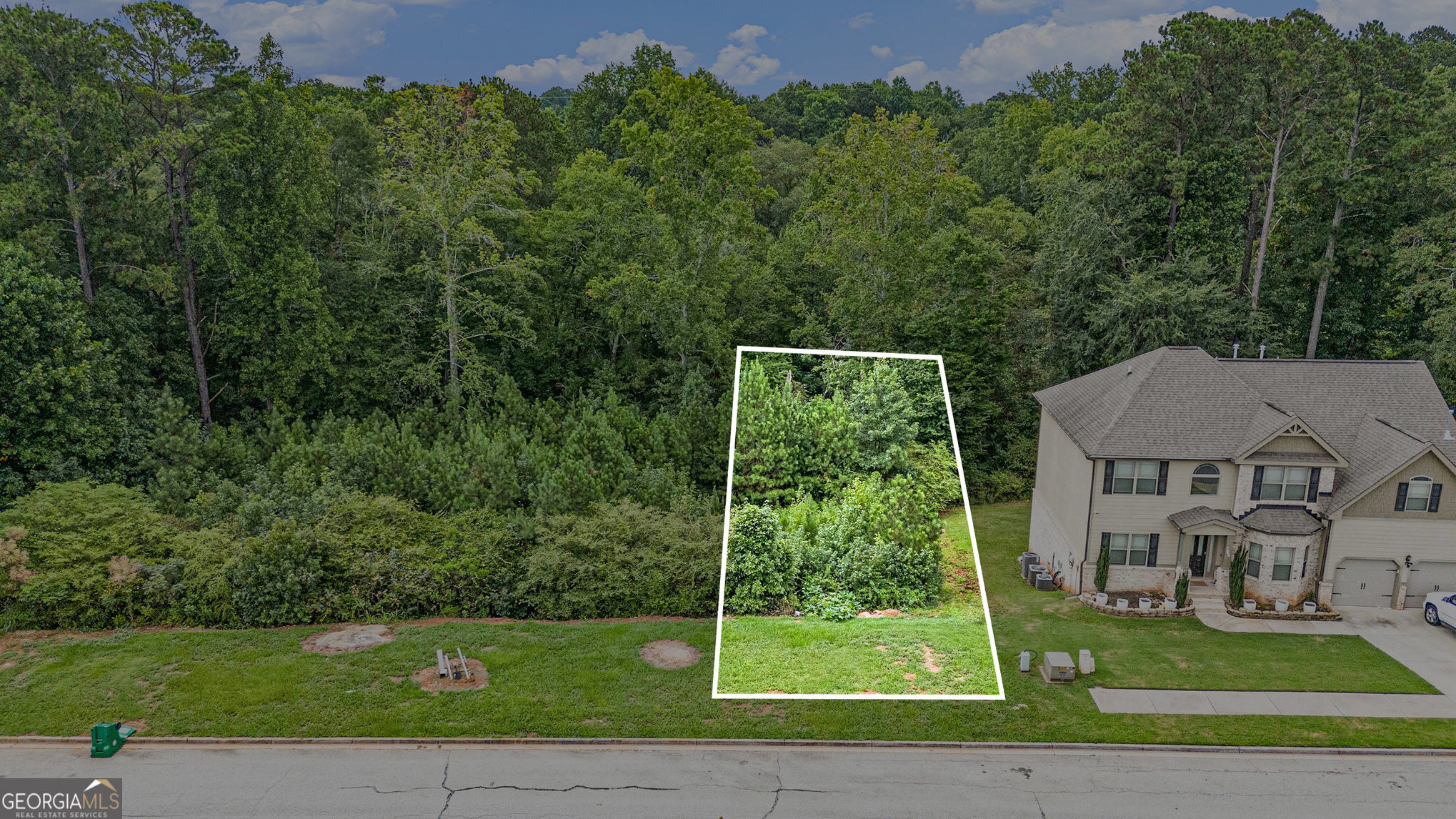 Fantastic opportunity in the well-established neighborhood of Parks at Stonecrest with its great amenities. Lot is zoned residential, and utilities are ready to go. Location, location, location-just minutes from Stonecrest Mall and I20. Seller would prefer to sell 7974 and 7980 together. 7974 and 7980 could be bundled into one sale.