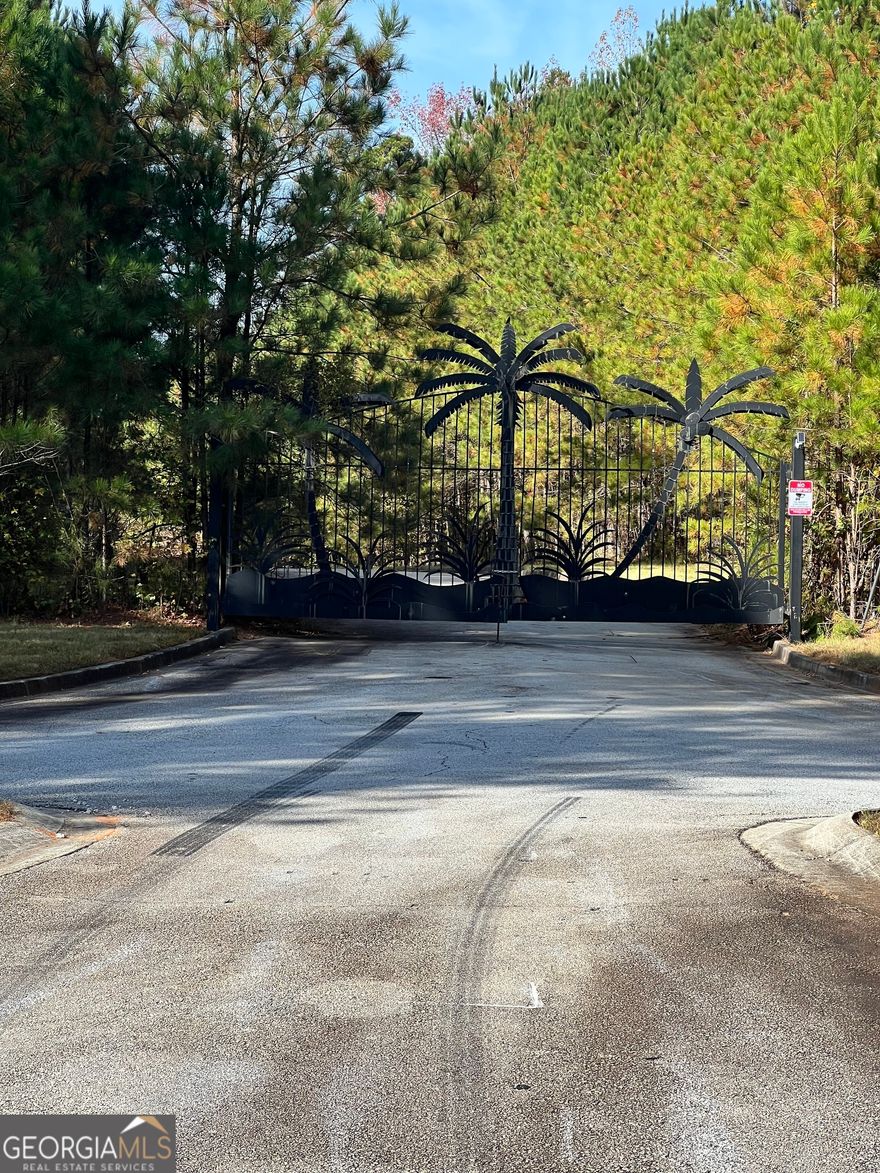 Presenting a prime development opportunity in Rockdale County, spanning just over 100 acres of serene, picturesque land. This gated property features 30 ready-to-build lots, with infrastructure in place, including utilities and paved roads. An additional 50 lots are available for future development, offering ample space for expansion. The site also boasts an approximately 8-acre stocked lake, creating a tranquil setting. Ideally located just minutes from local shopping, major interstates, and Hartsfield-Jackson Atlanta International Airport, this property combines convenience with natural beauty. Perfect for builders and investors looking to create a sought-after residential community