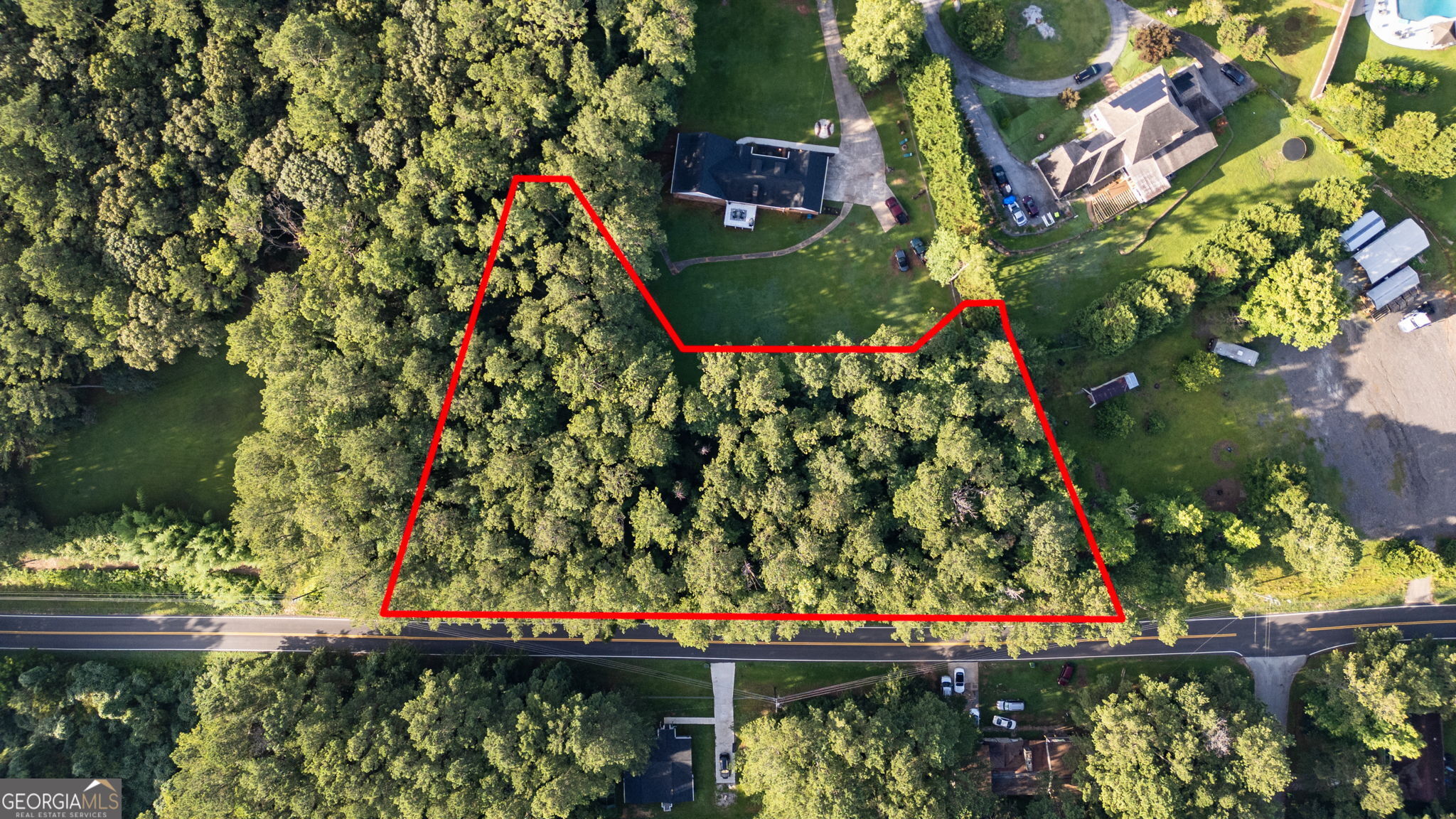Discover a rare opportunity to own 1.65 acres of flat, buildable land on Flakes Road in Stockbridge, GA-just 20 miles south of downtown Atlanta. This property offers the ideal combination of rural tranquility and urban convenience, with electric and water hookups already in place. A new soil test is on file, and the soil is approved for a septic system, making it an excellent candidate for your dream home, investment property, or private retreat. Located in historic Stockbridge-birthplace of Martin Luther King, Sr.-this lot is surrounded by a community rich in heritage and full of modern-day amenities. Enjoy year-round events like Bridgefest, the Arts & Crafts Festival, and summer concerts that bring the town to life. Outdoor enthusiasts will appreciate nearby Panola Mountain State Park, with hiking, archery, tree climbing, and breathtaking views. The area also offers easy access to Lake Spivey, Memorial Park, and Reeves Creek Trail, perfect for fishing, boating, walking, or a round of disc golf. Families will love the close proximity to top-rated Henry County schools, Piedmont Henry Hospital, and major shopping centers like Publix, Costco, and Home Depot. Stockbridge offers a welcoming, family-oriented lifestyle with a growing economy, all while being just a short drive from Atlanta's job market, airport, and entertainment. Whether you're looking to build now or hold for future growth, this lot presents the perfect blend of location, history, and potential. Don't miss your chance to claim a piece of this vibrant and fast-growing community.