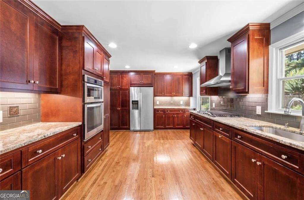 Photo of 392 Heritage Lane, Alpharetta, GA 30009 (MLS # 10836572)