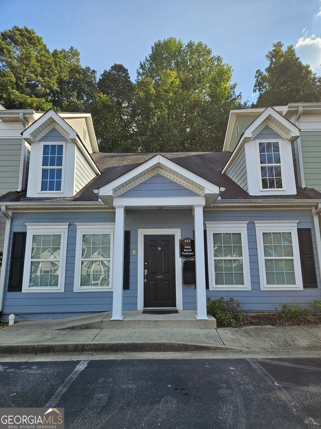 Photo of 500 W Lanier Ave #410, Fayetteville, GA 30214 (MLS # 10679121)