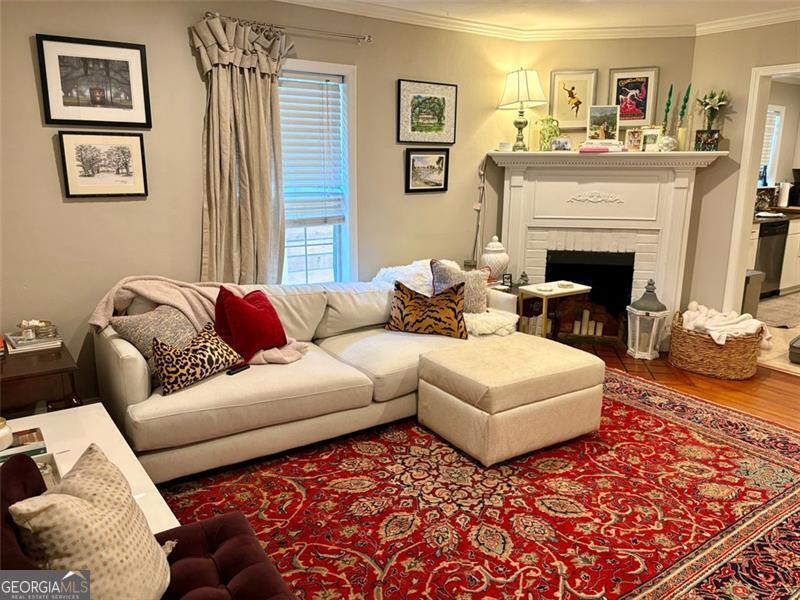 Don't miss the chance to live in the heart of Midtown! This 2-bedroom, 2-bathroom unit is ideally located close to Piedmont Park, with easy access from the Dutch Valley Pl and Westminster Dr entrance. This unit features hardwood floors throughout, a kitchen with granite countertops and marble floors, a shared laundry and a shared fenced front yard. Biweekly yard maintenance, quarterly pest control, and water are included in the rent. This unit also has exclusive use of a detached 2-car garage. Experience city life near Piedmont Park, the Beltline, and an array of shops and restaurants - all in one of Atlanta's most vibrant neighborhoods. Agent owned and managed.