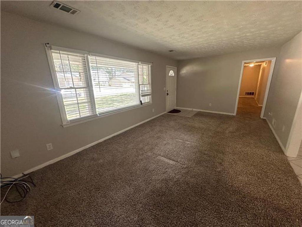 Photo of 727 S Carter Drive, Jonesboro, GA 30236 (MLS # 10624611)