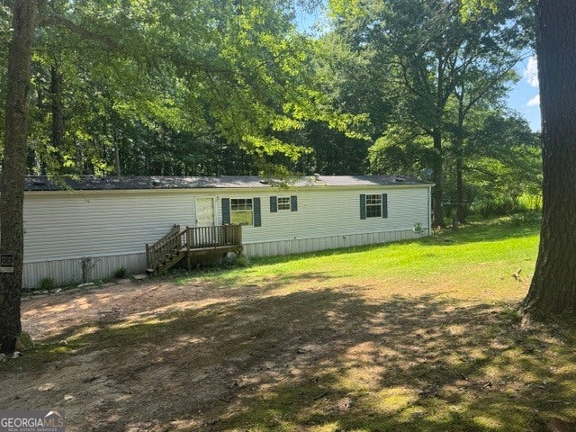 Photo of 1065 Puckett Road, Auburn, GA 30011 (MLS # 10801065)