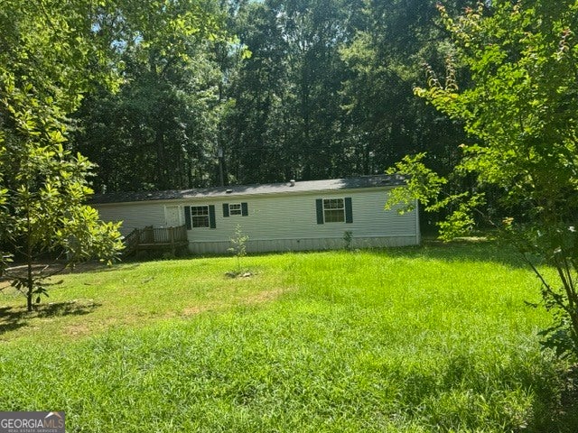 Photo of 1065 Puckett Road, Auburn, GA 30011 (MLS # 10801065)