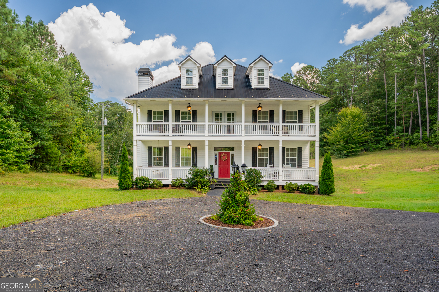Stunning 3-Story Home with 2-Story Library, Private Setting, and Endless Character! Welcome to this exceptional 3-story home situated on approx. 1.7 acres with a poured wall basement, offering a rare combination of elegance, functionality, and privacy. Nestled among mature trees with woods surrounding the property on three sides, this home provides the perfect retreat while still offering convenience & comfort. Main Level Highlights: Step into the welcoming foyer that sets the tone for the home's charm & warmth. The formal dining rm is ideal for hosting gatherings, while the formal living rm features a cozy wood-burning fireplace for those crisp evenings. A versatile sitting rm/office/den provides flexible space to meet your lifestyle needs. The heart of the home is the spacious kitchen, complete with custom-built cabinetry, concrete counters,& ample workspace for cooking & entertaining. Off the kitchen, enjoy the bright & inviting sun rm, perfect for morning coffee. A generous laundry rm, half bath, & covered back porch round out the main level. Second Level Highlights: you'll find 3 generously sized bedrms, each with its own walk-in closet. The primary suite is a true retreat, featuring a private bath with a corner soaking tub, separate shower, & 2 separate vanities. A full hall bath serves the additional bedrms. The show-stopping two-story library is located on this level, boasting custom built-in bookshelves & soaring ceilings, perfect for book lovers, collectors, or anyone needing an inspiring space. Third Level Highlights: offers a 4th bedrm, bonus rm, or multi-purpose space that can serve as a playrm, home theater, or game rm. A charming secret door provides direct access to the library, adding a touch of whimsy & uniqueness. Additional Features: Unfinished basement with endless potential for future expansion or storage. Private wooded setting with trees on 3 sides of the home. Fenced-in area perfect for pets, gardening or play. Covered porches& balcony ideal for enjoying nature.With 4 bedrooms, 2.5 baths, 2 story library, and unique architectural details, this home offers a blend of sophistication and comfort. Whether you're entertaining, working from home, or enjoying quiet moments in nature, this property delivers it all.
